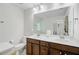 Spacious bathroom featuring double sinks with vanities and a separate toilet area at 3706 Blackjack Rd, Ladson, SC 29456