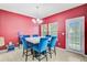 Dining room featuring stylish blue chairs and a modern chandelier at 3706 Blackjack Rd, Ladson, SC 29456