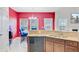 Stylish kitchen with granite counters and bright adjacent dining area at 3706 Blackjack Rd, Ladson, SC 29456