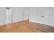 An empty bedroom featuring hardwood floors and white trim at 400 Bay Crossing Rd, Mount Pleasant, SC 29464