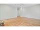 Bright, airy room with hardwood floors, neutral color palette, and access to ensuite bathroom at 400 Bay Crossing Rd, Mount Pleasant, SC 29464