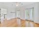 Bright and airy bedroom featuring hardwood floors, ceiling fan, and access to balconies at 400 Bay Crossing Rd, Mount Pleasant, SC 29464
