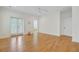 Spacious primary bedroom features hardwood floors, access to balcony, and ensuite bathroom at 400 Bay Crossing Rd, Mount Pleasant, SC 29464