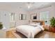Staged bedroom with hardwood floors and closet doors at 400 Bay Crossing Rd, Mount Pleasant, SC 29464