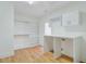 Spacious closet features custom shelving and cabinets, offering ample storage at 400 Bay Crossing Rd, Mount Pleasant, SC 29464