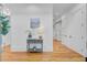 Bright hallway featuring hardwood floors, elegant decor, and seamless flow into other rooms at 400 Bay Crossing Rd, Mount Pleasant, SC 29464
