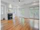 A formal living room features a fireplace, hardwood floors, and recessed lighting at 400 Bay Crossing Rd, Mount Pleasant, SC 29464
