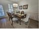 Elegant dining room features a wooden table, stylish chairs, and refined decor for a sophisticated dining experience at 4013 Conant Rd, Mount Pleasant, SC 29466
