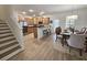 Well-lit kitchen and dining area with wood cabinets and stainless steel appliances at 4013 Conant Rd, Mount Pleasant, SC 29466