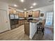 Spacious kitchen with granite counters, stainless appliances, and breakfast bar at 4013 Conant Rd, Mount Pleasant, SC 29466