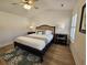 Bright primary bedroom has a large bed, coordinating decor, and plenty of natural light at 4013 Conant Rd, Mount Pleasant, SC 29466
