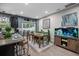 Cozy dining area featuring a stylish table, modern decor, and natural light at 409 Grand Palm Ln, Summerville, SC 29485