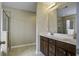 Bright bathroom with double sink vanity and a glass enclosed shower at 484 Whispering Breeze Ln, Summerville, SC 29486