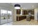 Kitchen area with stainless steel appliances and dark cabinets at 484 Whispering Breeze Ln, Summerville, SC 29486