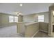 Spacious upstairs loft area with neutral carpet, windows and ceiling fan at 484 Whispering Breeze Ln, Summerville, SC 29486