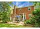 Spacious backyard with a patio, perfect for outdoor gatherings and relaxation under a clear sky at 49 Crosscreek Dr, Charleston, SC 29412