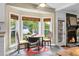 Cozy breakfast nook with bay window, perfect for enjoying morning coffee at 49 Crosscreek Dr, Charleston, SC 29412