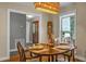 Dining room featuring a wood table, setting, and a view to the front entry at 49 Crosscreek Dr, Charleston, SC 29412