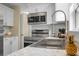 Kitchen area featuring white cabinets, stainless appliances, and granite counters at 49 Crosscreek Dr, Charleston, SC 29412