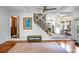Bright living room with staircase and view into the modern kitchen at 49 Crosscreek Dr, Charleston, SC 29412