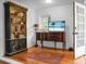 Cozy living room with bookshelf, wood floors, and a television at 49 Crosscreek Dr, Charleston, SC 29412