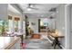 Open kitchen and living space with fireplace, natural light, and a modern design at 49 Crosscreek Dr, Charleston, SC 29412