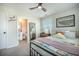 Comfortable bedroom with ceiling fan, large mirror and adjoining bathroom at 603 Cavour Ct, Summerville, SC 29486
