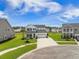 Beautiful two-story home with a well-kept lawn and landscaping, close to a pond at 603 Cavour Ct, Summerville, SC 29486