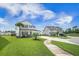 Charming two-story home boasts curb appeal with manicured lawn and mature landscaping at 603 Cavour Ct, Summerville, SC 29486