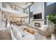 Expansive living room with second story, open layout, fireplace, and seamlessly connects the living spaces at 603 Cavour Ct, Summerville, SC 29486