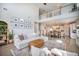 Spacious living room showcases an open floor plan connecting to the kitchen with a second story and modern aesthetic at 603 Cavour Ct, Summerville, SC 29486