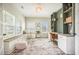 Well-lit home office featuring custom shelving, built in desk, and large windows with natural light at 603 Cavour Ct, Summerville, SC 29486