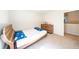 Bright bedroom featuring a wood bed frame and a charming dresser with playful decorations at 619 Red Mulberry Rd, Moncks Corner, SC 29461