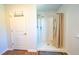 Shower stall with white tile and a curtain at 619 Red Mulberry Rd, Moncks Corner, SC 29461
