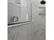 Tiled shower featuring glass partition, neutral decor, and built-in niche at 626 Chigwell Springs Ln, Summerville, SC 29486