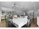 Inviting dining room with a view of the living room and kitchen, perfect for Gathering gatherings and entertaining guests at 626 Chigwell Springs Ln, Summerville, SC 29486