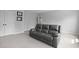 Spacious living room with plush carpet and comfortable seating, perfect for relaxing or entertaining guests at 626 Chigwell Springs Ln, Summerville, SC 29486