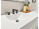 Close-up of the bathroom vanity with a modern matte-black faucet, and an integrated sink at 6305 Lucille Dr, North Charleston, SC 29406