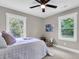 Inviting bedroom with large windows offering natural light and views of the lush greenery at 6305 Lucille Dr, North Charleston, SC 29406