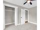 Neutral bedroom features a spacious closet with ample storage at 6305 Lucille Dr, North Charleston, SC 29406