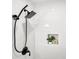 Shower features sleek, matte-black fixtures, white tile walls, and built in niche at 6305 Lucille Dr, North Charleston, SC 29406