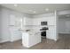 Bright kitchen with stainless steel appliances, island, and white cabinets offering a sleek design at 725 Meadowbrook Ln, Summerville, SC 29486