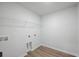 The laundry room has plank floors and modern outlets at 725 Meadowbrook Ln, Summerville, SC 29486