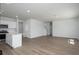 Open-concept kitchen and living area with a center island and seamless flow for modern living at 725 Meadowbrook Ln, Summerville, SC 29486