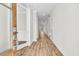 Bright hallway with wood floors and a glimpse of the interior, with natural light at 735 Maynard Ln, Summerville, SC 29486