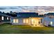 A well maintained backyard featuring a covered patio with an outdoor seating area, perfect for relaxation at 755 Meadowbrook Ln, Summerville, SC 29486