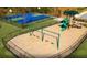 Community playground area including swings, slides, and a basketball court at 755 Meadowbrook Ln, Summerville, SC 29486