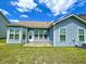 Back exterior view of home, showcasing the backyard at 7629 High Maple Cir, North Charleston, SC 29418