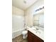 Bathroom featuring a combination shower and tub at 7629 High Maple Cir, North Charleston, SC 29418