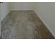 Empty room with neutral carpet and white trim at 7629 High Maple Cir, North Charleston, SC 29418